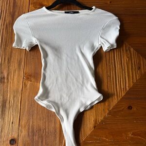Lulu's White Ribbed Short Sleeve Bodysuit